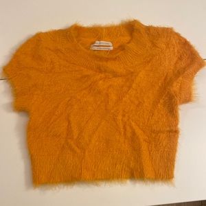Cropped orange fuzzy top